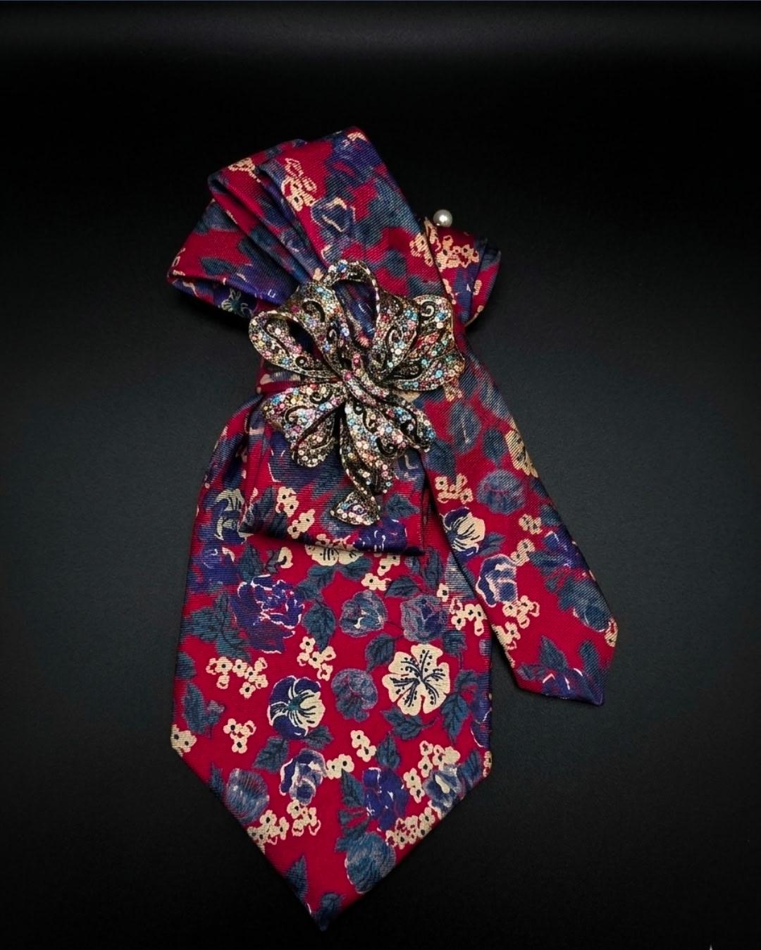 Red floral Tied in Power neckpiece with jeweled flower