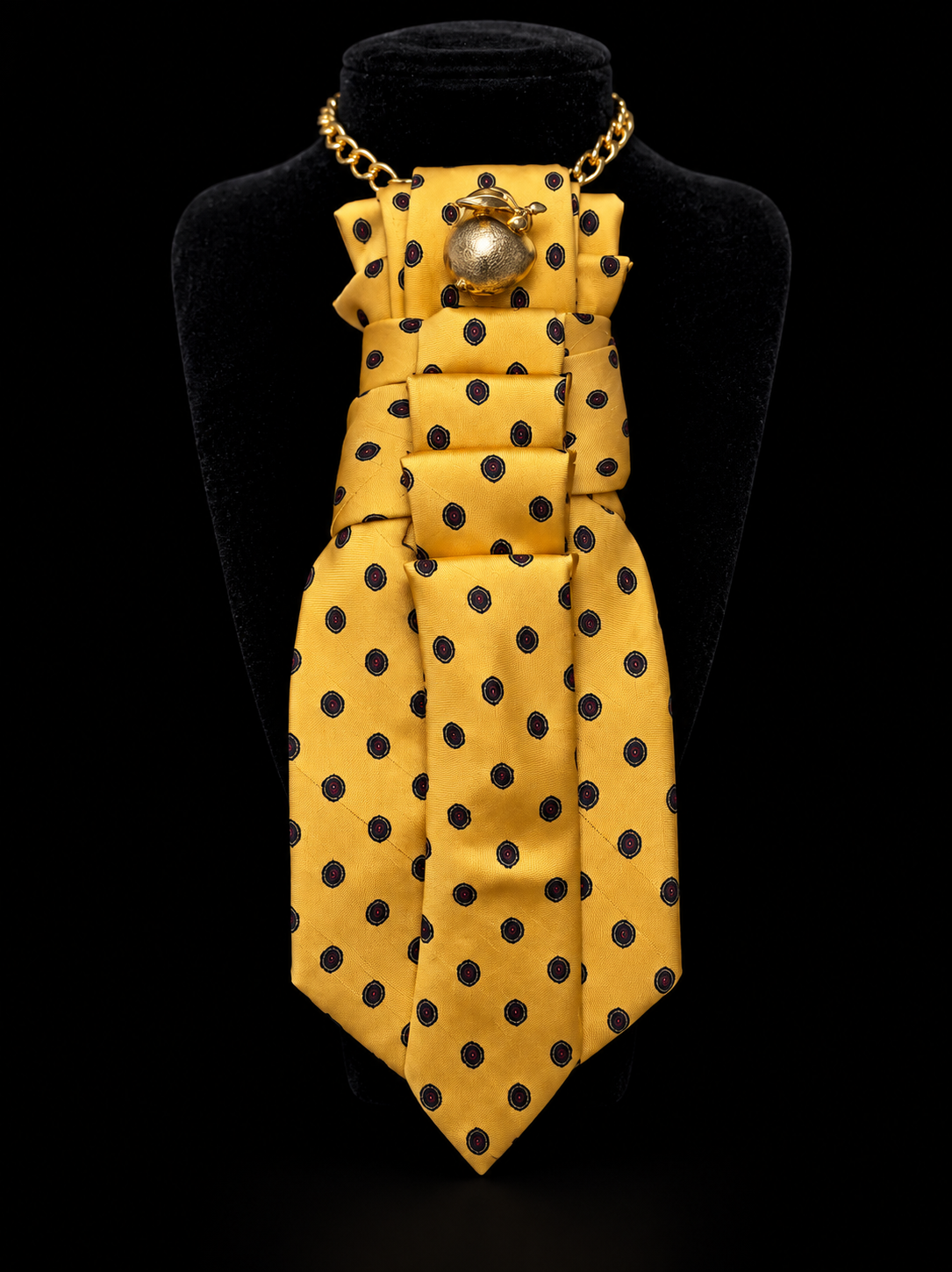 Golden yellow neckpiece with sculptural folds